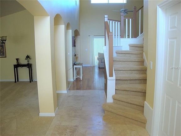 The staircase will take you to 4 additional bedrooms and 2 full baths, both with shower and tub.  One of the bathrooms is a Jack