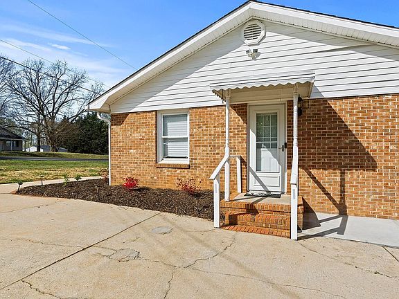 Side view of home with kitchen access.
