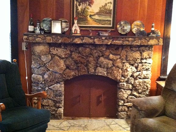 hand-built stone fireplace
