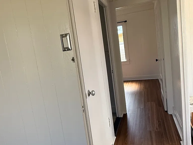 Hall way, leading to bedrooms and bathroom