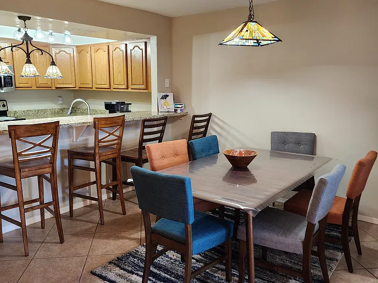 Enjoy a casual dining room with a breakfast bar.
