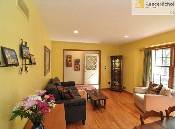 Gorgeous hardwoods in sun-filled living room