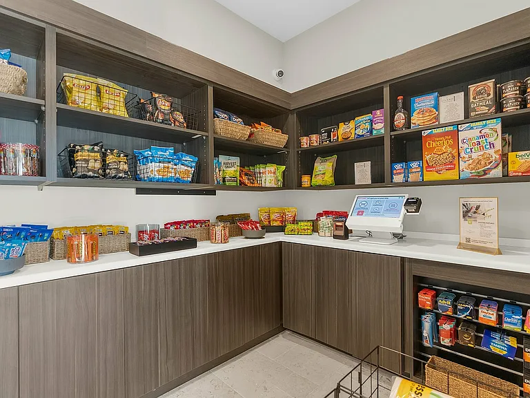 Explore the convenience of this well-stocked essentials corner, perfect for your daily needs.