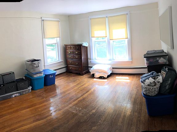 Bedroom 1. Mirror on right wall and long dresser beneath inc