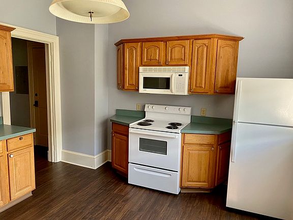 Spacious kitchen has sunny southern exposure.