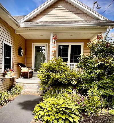 Front entrance with a private porch for relaxing and watching the sun set!