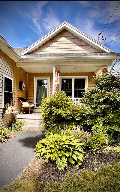 Front entrance with a private porch for relaxing and watching the sun set!