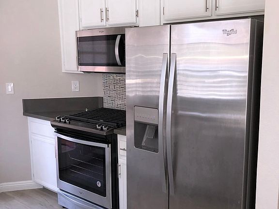 Large refrigerator with water/ice in door