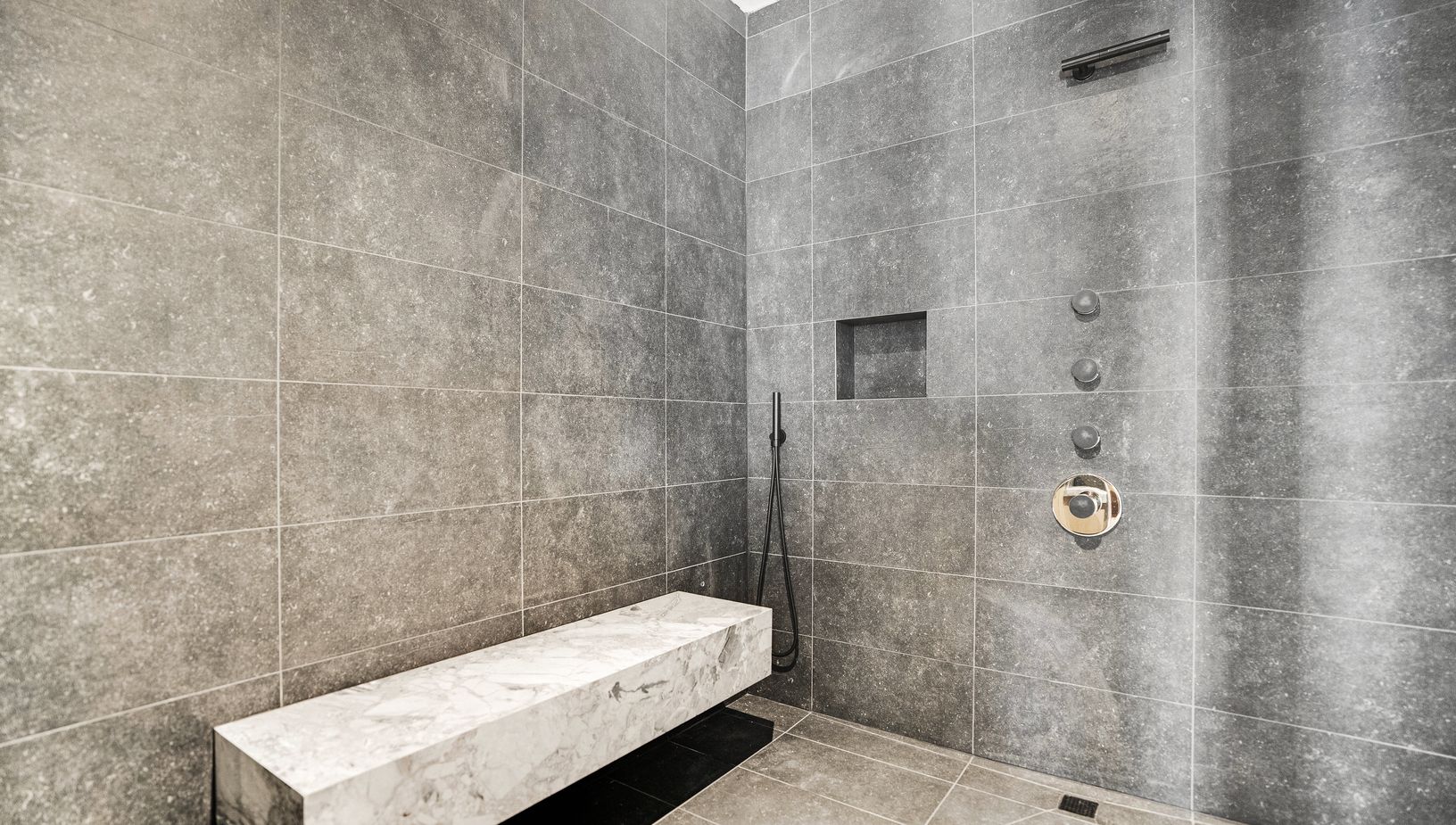  5 person Spa Rainfall ceiling shower + Vola waterfall rain head.
