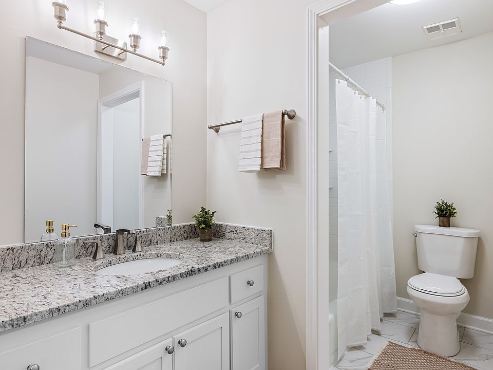 Redbud floor plan - Bathroom vanity and shower area.