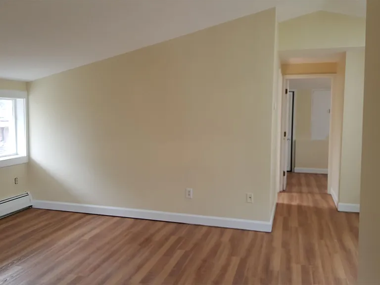 Living room to hall. To right is entry. Straight ahead Back BR to left 2nd BR. Bath in between BR's.