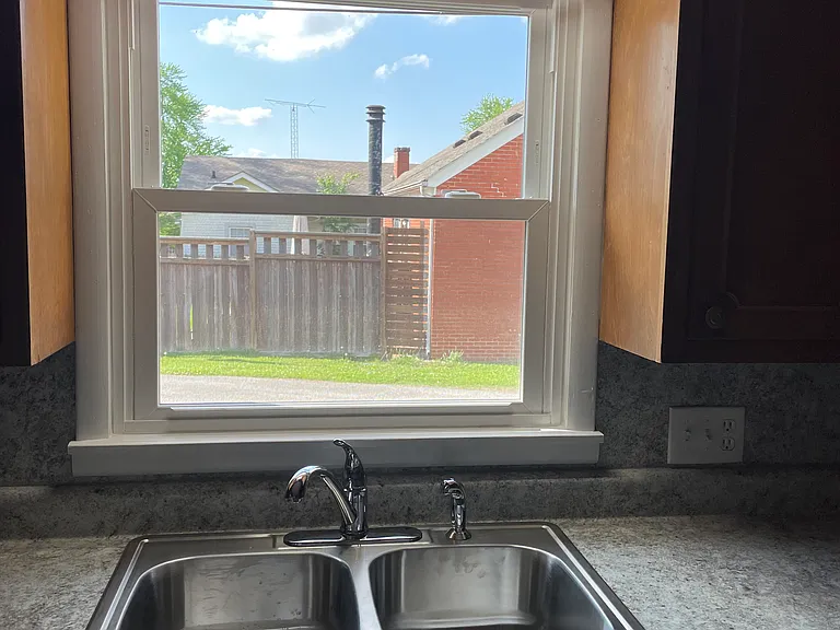 Kitchen updated 2024. New sink, counters, dishwasher, paint and backsplash. New stove in August 2025.