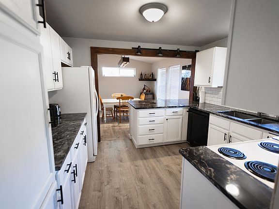 By front door, looking into kitchen