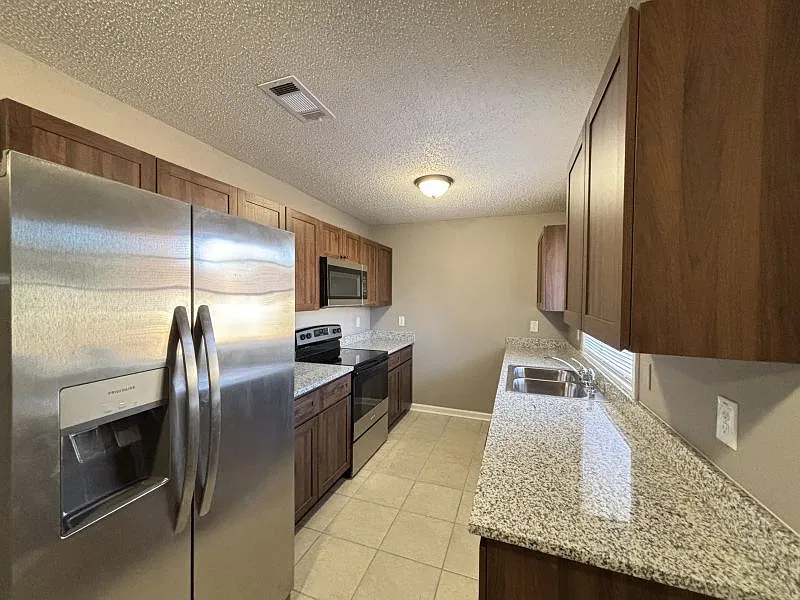 8704 Labette Dr — Photo 3