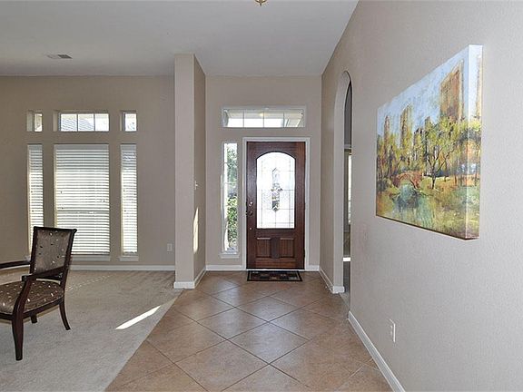 High ceilings and tiled entrance.