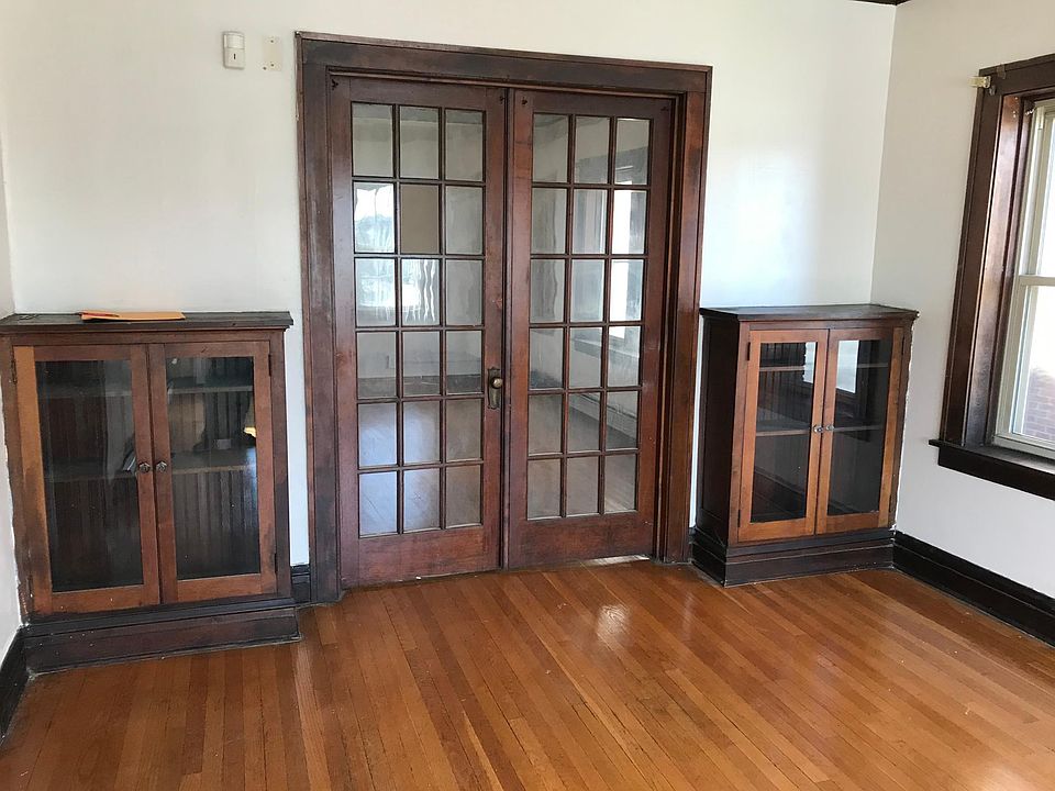 Formal dining room with built-in cabinets