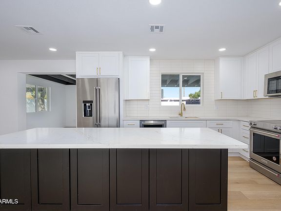 5th image of 7026 E VERNON Avenue