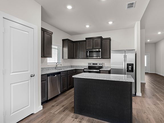 The kitchen has a convenient kitchen island.