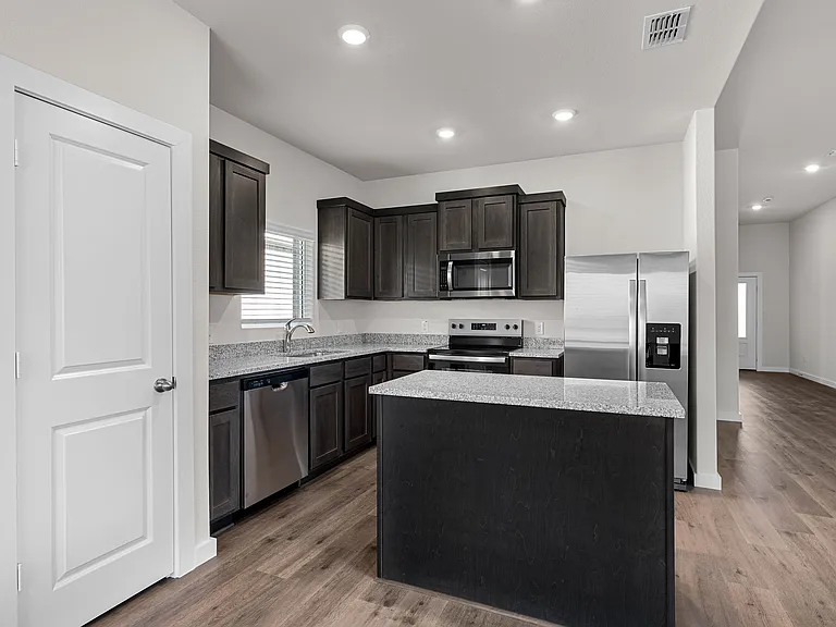 The kitchen has a convenient kitchen island.