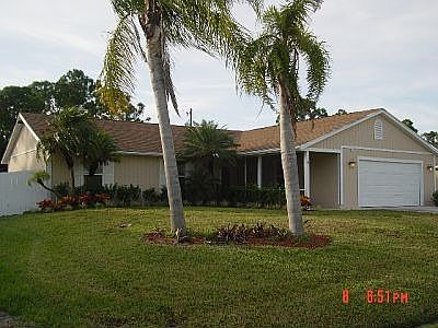 PALM TREES & FENCED YARD!