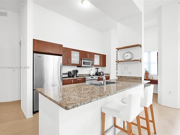 2nd image of 20000 E Country Club Dr APT 108