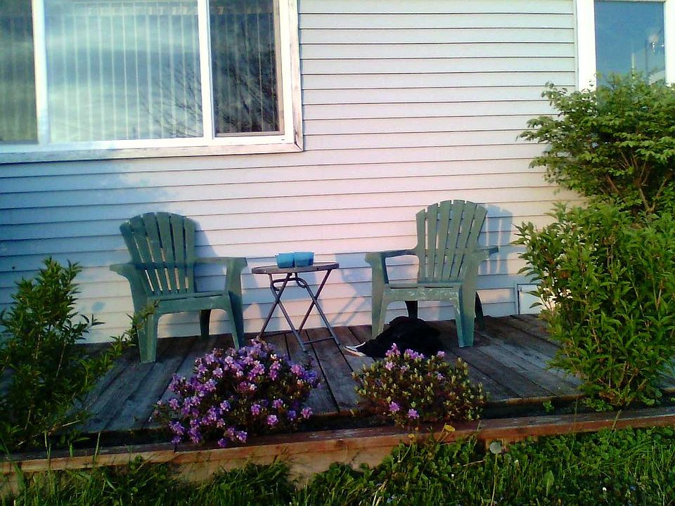Front deck faces the river.