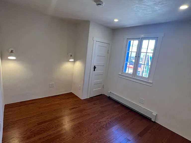 Bedroom contains a small closet.