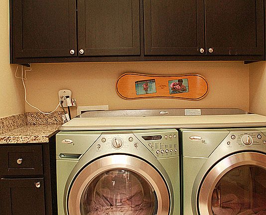 Laundry room next to closet