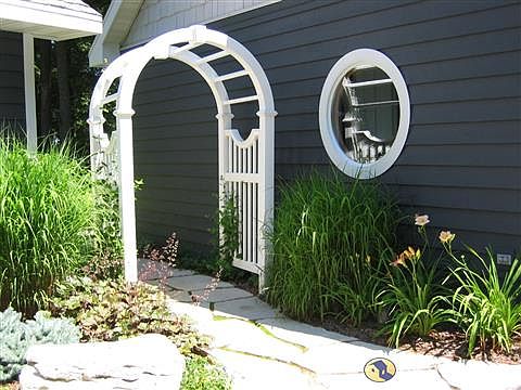 Honeysuckle Arbor next to home