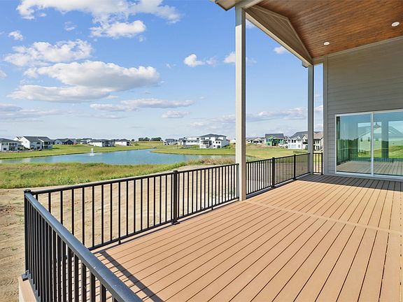 A partially cover deck with views to both ponds.