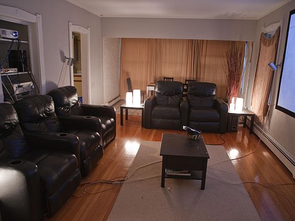 Dining room used as family room with dining area in sun room