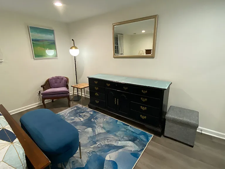 Another view of bedroom, cute sitting area, triple dresser