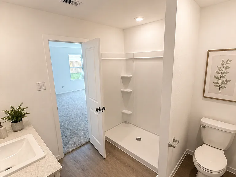 Functional and modern bathroom with clean lines and updated finishes throughout.