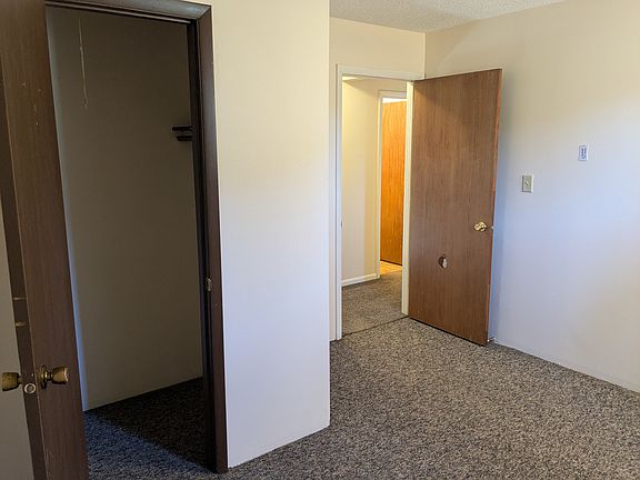 Bedrooms are mirror images of each other.