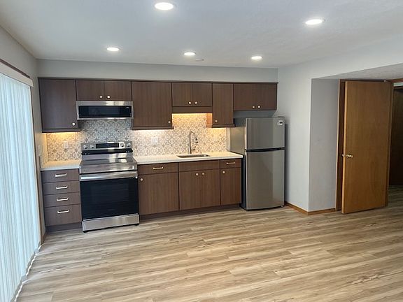 Lower level kitchen in large family room