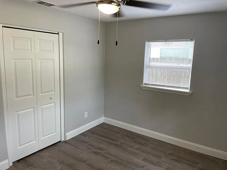 Bedroom 1 with ceiling fan