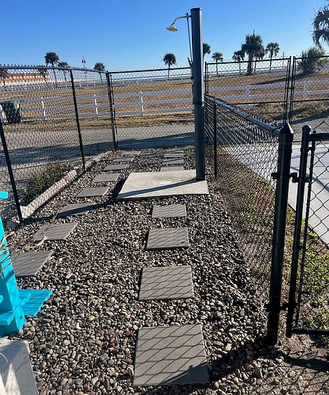 Outdoor shower and fence
