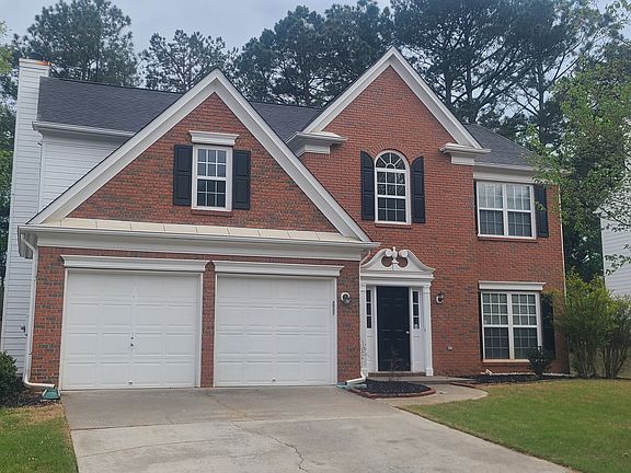 Front view with left side gated fence