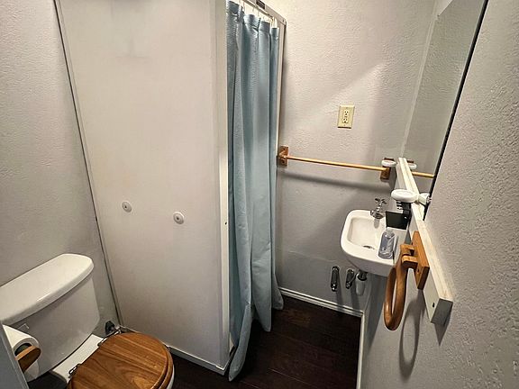 Bathroom with 30"x30" shower, sink, toilet