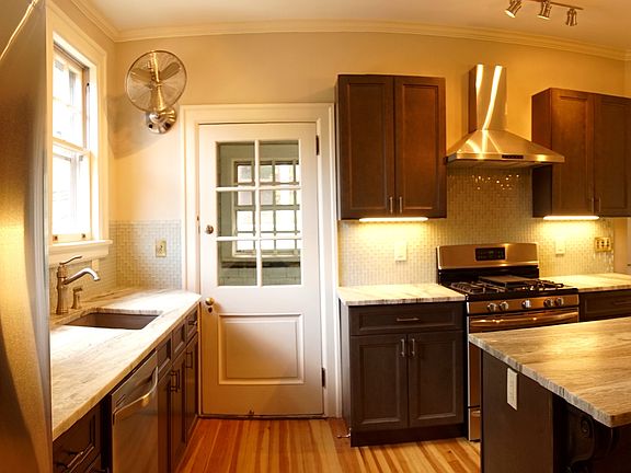 Stainless appliances and natural stone counters