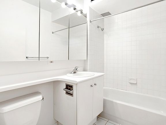 5th image of 160 W 22nd St APT 605