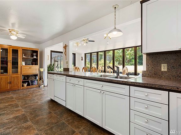 Kitchen #1 upstairs has been updated with ample cabinetry & plenty of counter space!
