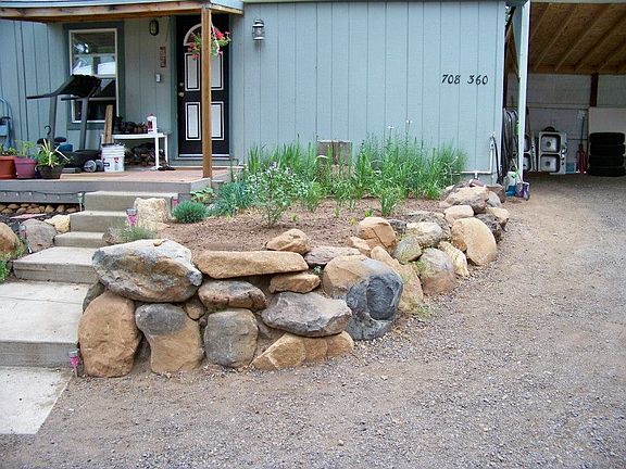 2nd Rock Wall front of House