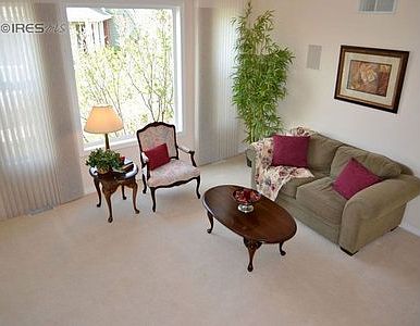Formal living room with soaring ceiling.