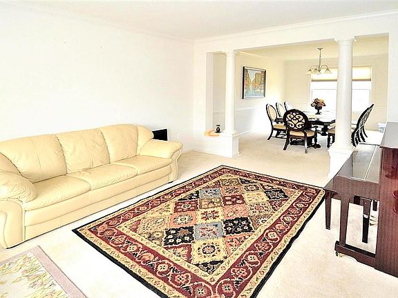 Formal Living Room Adjacent to Formal Dining Room