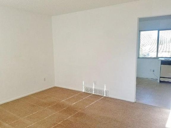 Living Room with Kitchen Entry