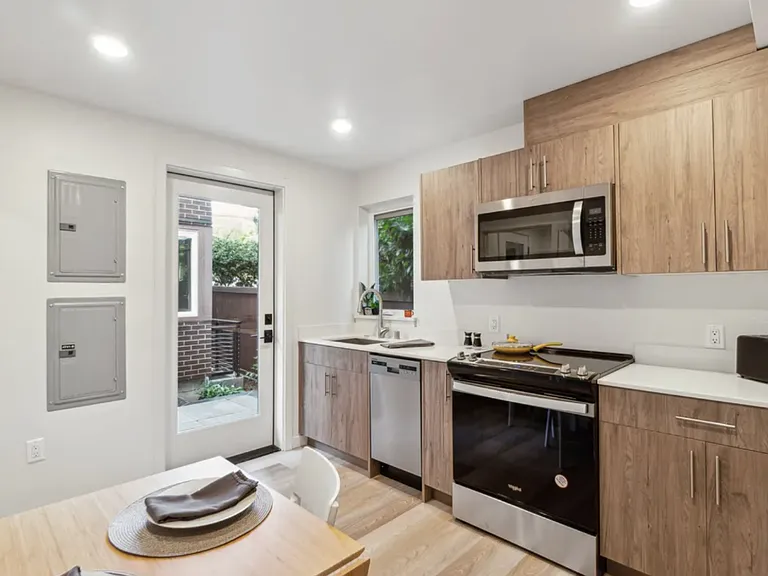 Modern Studio Living Just Steps from UW The Row Apartments — Photo 33