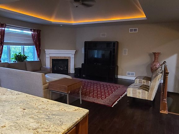 Main level livingroom is adjacent to the kitchen