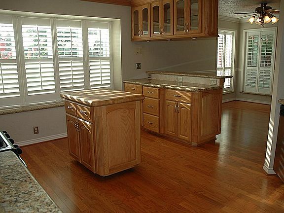 Island in middle of kitchen and two bar areas!