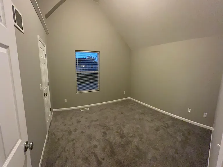 Secondbedroom with walk-in closet.